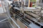 Used Jones Model CMV5 Semi-Automatic Tuck Vertical Cartoner. Machine is capable of speeds up to 120 cartons per minute. Has manual load station of 8' (both sides). Has 5