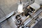 Used Jones Model CMV5 Semi-Automatic Tuck Vertical Cartoner. Machine is capable of speeds up to 120 cartons per minute. Has manual load station of 8' (both sides). Has 5