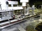 Used Jones CMV5 Semi Automatic Continuous Motion Vertical Tuck Cartoner. Capable of speeds up to 120 CPM. Has 5