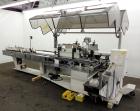 Used Jones Model CMV5 Semi-Automatic Tuck Vertical Cartoner. Machine is capable of speeds up to 120 cartons per minute. Has manual load station of 8' (both sides). Has 5