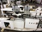 Used Jones Model CMV5 Semi-Automatic Tuck Vertical Cartoner. Machine is capable of speeds up to 120 cartons per minute. Has manual load station of 8' (both sides). Has 5