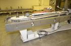 Used Jones Model CMV5 Semi-Automatic Tuck Vertical Cartoner. Machine is capable of speeds up to 120 cartons per minute. Has manual load station of 8' (both sides). Has 5