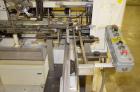 Used Jones Model CMV5 Semi-Automatic Tuck Vertical Cartoner. Machine is capable of speeds up to 120 cartons per minute. Has manual load station of 8' (both sides). Has 5