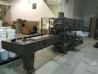 Used- Jones CMV5 Semi Automatic Continuous Motion Vertical Hot Melt Tuck Cartoner. Capable of speeds up to 120 cpm. Has 5