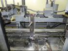 Used Jones CMV8 semi automatic vertical cartoner, Model CMV8