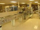 Used Jones CMV8 continuous motion vertical cartoner capable of speeds up to 120 cpm. Has 8
