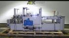 Used Kodiak Tanney Model 601-120 Vertical Cartoner. Capable of speeds up to 120 cartons per minute. Has rotary carton feed, has 9