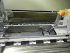Used Kodiak Tanney Model 601-120 Vertical Cartoner. Capable of speeds up to 120 cartons per minute. Has rotary carton feed, has 9