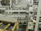 Used Kodiak Tanney Model 601-120 Vertical Cartoner. Capable of speeds up to 120 cartons per minute. Has rotary carton feed, has 9