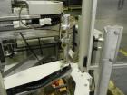 Used Kodiak Tanney Model 601-120 Vertical Cartoner. Capable of speeds up to 120 cartons per minute. Has rotary carton feed, has 9