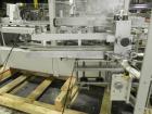 Used Kodiak Tanney Model 601-120 Vertical Cartoner. Capable of speeds up to 120 cartons per minute. Has rotary carton feed, has 9