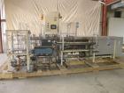 Used Paxall Clybourn Semi Automatic Vertical Hot Melt Cartoner, Model CHL-A. Capable of speeds up to 120 cpm. Has 6' long powered carton magazine with rotary carton feeder. Currently set up on 5