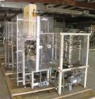 Used Paxall Clybourn Semi Automatic Vertical Hot Melt Cartoner, Model CHL-A. Capable of speeds up to 120 cpm. Has 6' long powered carton magazine with rotary carton feeder. Currently set up on 5