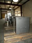 Used Paxall Clybourn Semi Automatic Vertical Hot Melt Cartoner, Model CHL-A. Capable of speeds up to 120 cpm. Has 6' long powered carton magazine with rotary carton feeder. Currently set up on 5