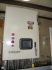 Used Paxall Clybourn Semi Automatic Vertical Hot Melt Cartoner, Model CHL-A. Capable of speeds up to 120 cpm. Has 6' long powered carton magazine with rotary carton feeder. Currently set up on 5