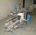 Used Tisma Intermittent Motion Vertical Hot Melt Cartoner, Model TC-50-E. Capable of speeds up to 60 CPM. Has 10