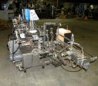 Used Tisma Intermittent Motion Vertical Hot Melt Cartoner, Model TC-50-E. Capable of speeds up to 60 CPM. Has 10