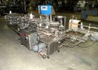Used Tisma Intermittent Motion Vertical Hot Melt Cartoner, Model TC-50-E. Capable of speeds up to 60 CPM. Has 10