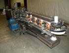 Used Tisma Intermittent Motion Vertical Hot Melt Cartoner, Model TC-50-E. Capable of speeds up to 60 CPM. Has 10