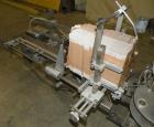 Used Tisma Intermittent Motion Vertical Hot Melt Cartoner, Model TC-50-E. Capable of speeds up to 60 CPM. Has 10