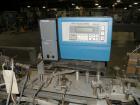 Used Tisma Intermittent Motion Vertical Hot Melt Cartoner, Model TC-50-E. Capable of speeds up to 60 CPM. Has 10