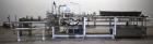 Used Clybourn CHL Vertical Hand Load Hot Melt Glue Cartoner. Capable of speeds from 10 to 100 cartoners per minute. Set on 10