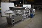 Used Clybourn CHL Vertical Hand Load Hot Melt Glue Cartoner. Capable of speeds from 10 to 100 cartoners per minute. Set on 10