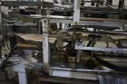 Used Clybourn CHL Vertical Hand Load Hot Melt Glue Cartoner. Capable of speeds from 10 to 100 cartoners per minute. Set on 10