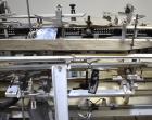 Used Clybourn CHL Vertical Hand Load Hot Melt Glue Cartoner. Capable of speeds from 10 to 100 cartoners per minute. Set on 10