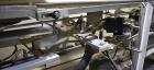 Used Clybourn CHL Vertical Hand Load Hot Melt Glue Cartoner. Capable of speeds from 10 to 100 cartoners per minute. Set on 10