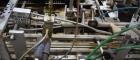 Used Clybourn CHL Vertical Hand Load Hot Melt Glue Cartoner. Capable of speeds from 10 to 100 cartoners per minute. Set on 10