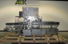 Used Tisma Vertical Cartoner, Model TC-50E. Capable of speeds to 200 cartons per minute. Currently set up with 2