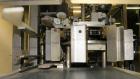 Used Tisma Vertical Cartoner, Model TC-50E. Capable of speeds to 200 cartons per minute. Currently set up with 2
