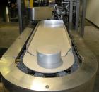 Used Tisma Vertical Cartoner, Model TC-50E. Capable of speeds to 200 cartons per minute. Currently set up with 2