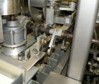Used Tisma Vertical Cartoner, Model TC-50E. Capable of speeds to 200 cartons per minute. Currently set up with 2