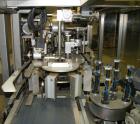 Used Tisma Vertical Cartoner, Model TC-50E. Capable of speeds to 200 cartons per minute. Currently set up with 2