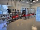 Used Tishma Model TT-50 Vertical Cartoner with Automatic Bottle Loader and Prefo