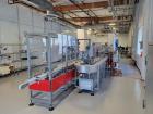 Used Tishma Model TT-50 Vertical Cartoner with Automatic Bottle Loader and Prefo