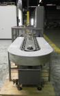 Used Tisma (SWF) VT-100-RH Vertical Cartoner with glue flap closures. Capable of speeds up to 200 cartons per minute. Unit has 7.5