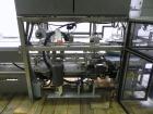 Used Tisma (SWF) VT-100-RH Vertical Cartoner with glue flap closures. Capable of speeds up to 200 cartons per minute. Unit has 7.5