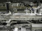 Used Tisma (SWF) VT-100-RH Vertical Cartoner with glue flap closures. Capable of speeds up to 200 cartons per minute. Unit has 7.5