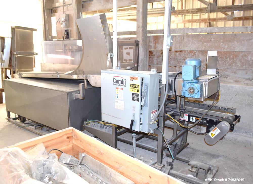 Used Combi Packaging Systems 3CE Case Erector. Includes a control panel with Allen-Bradley MicroLogix controller. 460/60/3, 30 amp. Serial# 3CE118816.