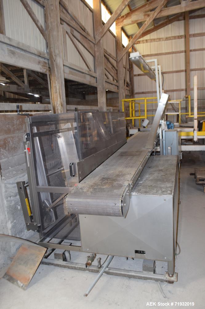 Used Combi Packaging Systems 3CE Case Erector. Includes a control panel with Allen-Bradley MicroLogix controller. 460/60/3, 30 amp. Serial# 3CE118816.