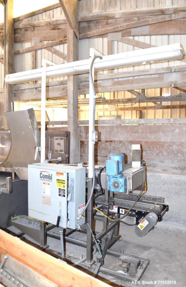 Used Combi Packaging Systems 3CE Case Erector. Includes a control panel with Allen-Bradley MicroLogix controller. 460/60/3, 30 amp. Serial# 3CE118816.