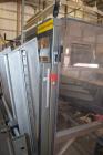 Used Combi Packaging Systems 3CE Case Erector. Includes a control panel with Allen-Bradley MicroLogix controller. 460/60/3, 30 amp. Serial# 3CE118816.