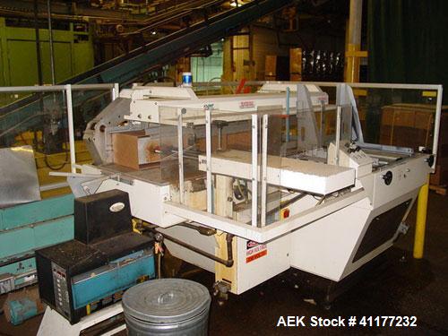 Used SWF Mcdowell 201LH case erector and bottom sealer capable of speeds up to 30 cases per minute. Has Nordson 3400 glue system and a case size range: length 7" to 24", width 6" to 16", 4" to 16". 3...