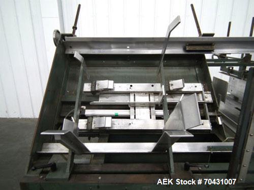 Used Padlocker Model Caseform 151 Care Erector with Nordson 3500 hot melt glue system.  Electric 3/60/230V.