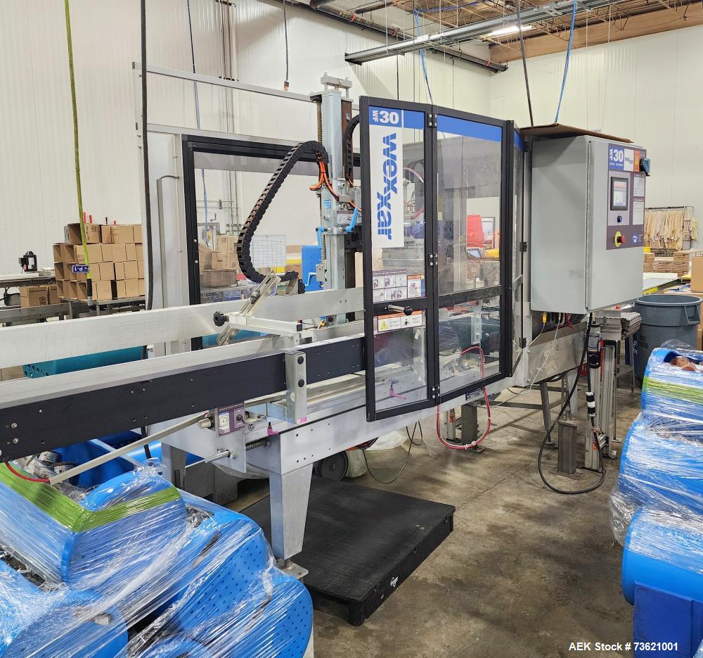 Used Wexxar Automatic Case Erector Sealer, Model WF-30. Machine is capable of speeds up to 30 cases per minute (depending on case size). Pin and dome-style opening. Nordson hot melt glue unit. Has a ...