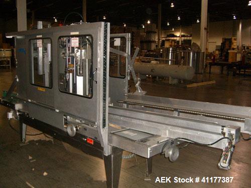Used Wexxar Automatic Case Former / Erector With Hot Melt Glue Bottom Sealer, Model WFT. Capable of speeds up to 18 cpm. Case Size Range: length 7" to 22", width 6" to 17", height 6" to 20". Has AB S...