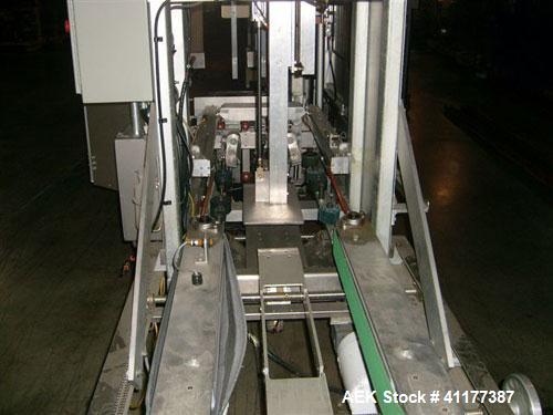 Used Wexxar Automatic Case Former / Erector With Hot Melt Glue Bottom Sealer, Model WFT. Capable of speeds up to 18 cpm. Case Size Range: length 7" to 22", width 6" to 17", height 6" to 20". Has AB S...
